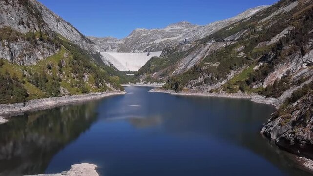 Flight over Kolnbrein Dam and Kolnbreinspeicher lake in Carinthia, Austria. 2.5x speeded up from 24 fps.