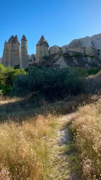 Hiking Through a Golden Meadow in Cappadocia&rsquo;s Love Valley (Goreme, Cappadocia, Turkey)