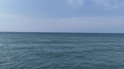 Fototapeta premium Vast Blue Ocean and Clear Sky Horizon