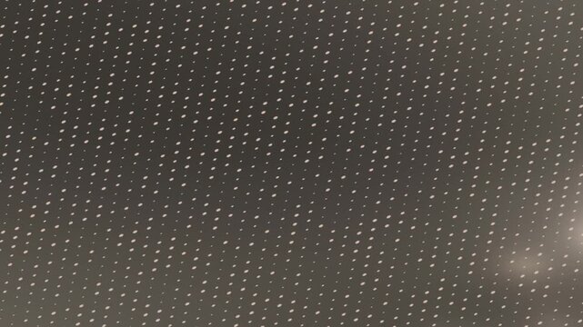 Opening montage showing soft dot patterns and warm bokeh background
