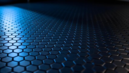 Naklejka premium Close-up of a hexagonal grid pattern with blue lighting on a dark surface