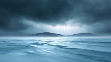 Obraz premium Serene Seascape with Dark Clouds and Calm Waters, Mountains on the Horizon, Atmospheric Scene Capturing Nature's Beauty in Moody Light