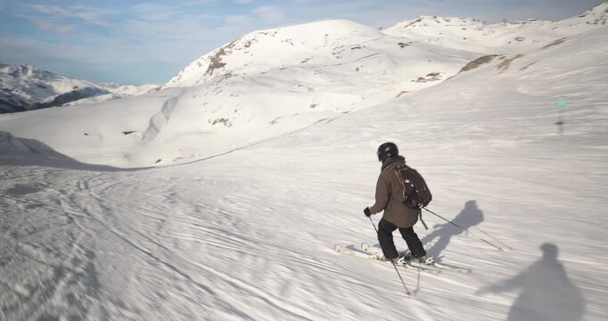 Skier fast follow action shot skiing