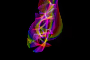 Light painting photograph. Effects created with lights in the dark. Abstract light shapes.