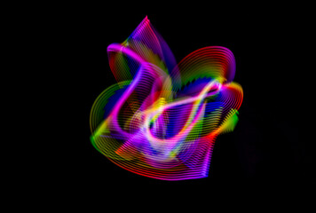 Light painting photograph. Effects created with lights in the dark. Abstract light shapes.