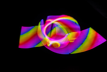 Light painting photograph. Effects created with lights in the dark. Abstract light shapes.
