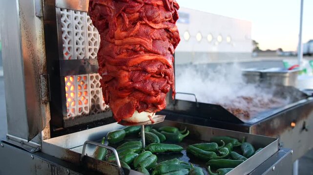 Slow Motion Al Pastor Meat Rotating on a Vertical Trompo Grill