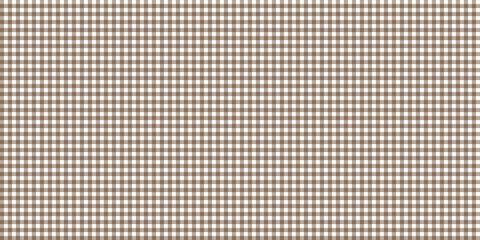 Seamless brown and white gingham pattern background. Classic checkered plaid texture for fabric, tablecloth, or wallpaper design. High-resolution geometric repeating square motif.