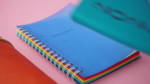 Notebook and stationery on a colorful workspace