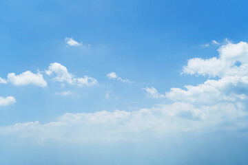 Beautiful clouds during spring time in a Sunny day. Blue sky and white fluffy clouds