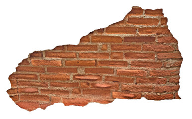 A section of a broken brick wall. Fragment of weathered, red brick wall with cracked mortar, revealing inner layers
