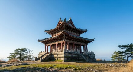 Obraz premium Ancient Asian temple pagoda on hill with clear blue sky background
