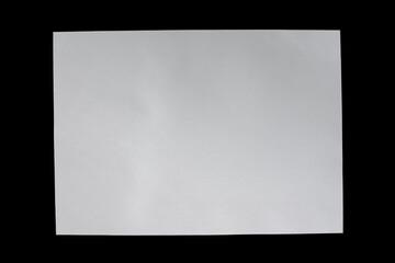 Obraz premium A white A4 sheet of paper on a black background.