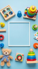 Obraz premium Colorful Baby Toys and Frame on Blue Background - A Playful Composition.