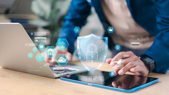 Cybersecurity and data protection concept. Business professional securing digital information with encrypted network, cloud security and privacy protection technology.