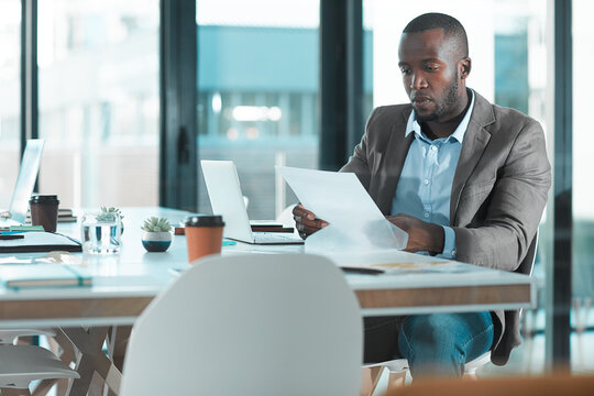 Paperwork, reading or black man in office for audit, planning tax return or check reimbursement form. Review records, finance report or accountant with statement of transactions, cash flow or budget