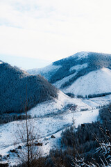 Obraz premium Jasná ski resort in the Low Tatras Mountains, located in the Liptov region of Slovakia. Snow-covered peaks, alpine slopes, and winter landscape create a popular destination for skiing