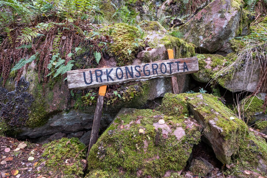 Urkons grotta cliff and cave at the Sommen lake in Sweden