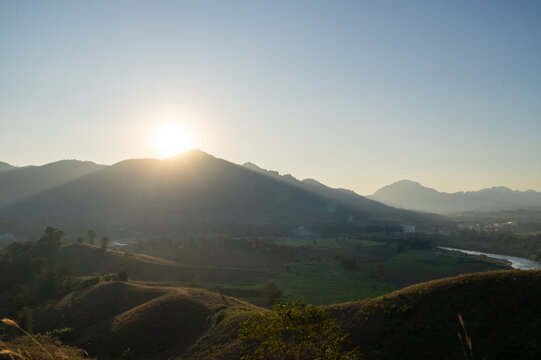 Sunrise over rolling hills nature landscape scenic viewpoint tranquil environment
