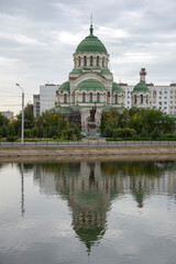 Fototapeta premium View on Vladimir Cathedral with reflection. Astrakhan