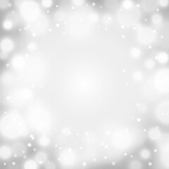 Silver bokeh background with white light circles and soft blur for luxury festive holiday designs