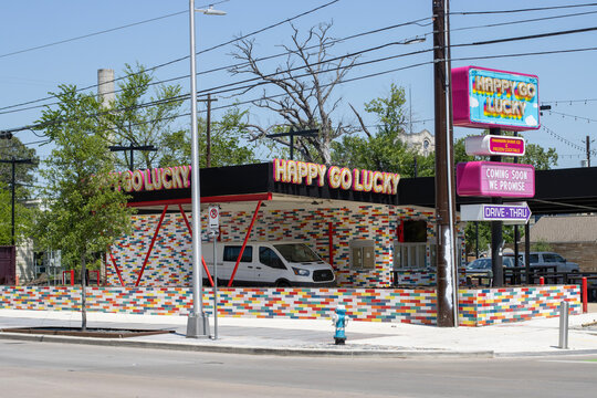 Houston, TX, USA - Apr 9, 2025: The coming-soon Happy Go Lucky Hawaiian shaved ice shop with drive-thru service in the Houston Heights.