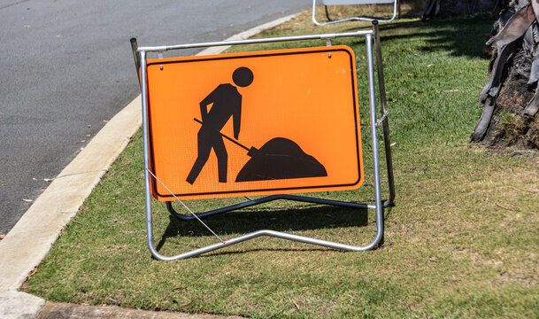A construction sign on a street verge