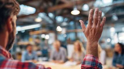 Man raising hand during meeting close up