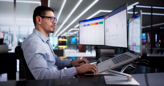 Man Using CRM Software To Efficiently Manage Leads