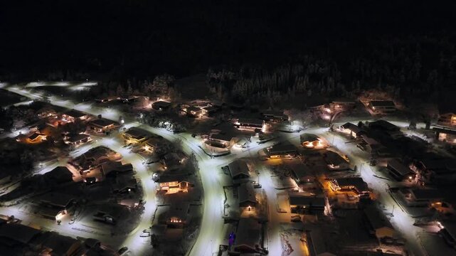 Aerial nighttime view of the suburban area of Storbakken on the island of Freioeya in Kristiansund municipality, Norway.