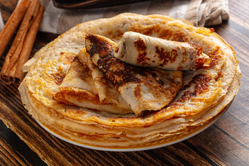 Thin homemade golden pancaces stack