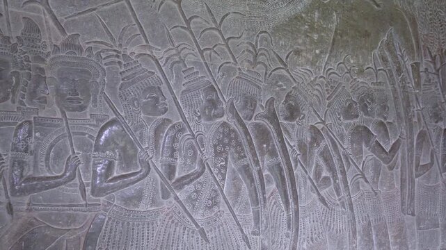 SIEM REAP, CAMBODIA - OCTOBER 27, 2025: Ancient Narrative Bas-Relief Stone Carvings on Angkor Wat Gallery Walls