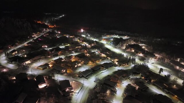 Aerial nighttime view of the suburban area of Storbakken on the island of Freioeya in Kristiansund municipality, Norway.