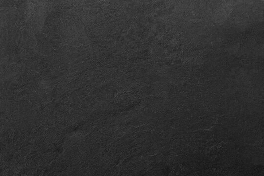 Dark grey black slate background or texture.