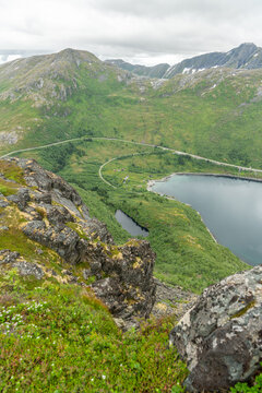 View from Barden mountain train to &Oslash;yfjorden fjor Beautiful nature, mountains surrounding fjord. Travel destination. Wild arctic mountains, snow on mountain peaks.