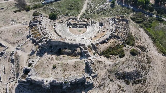 Footage of historical ruins, columns, ancient theater and temples in the ancient city of Miletus.