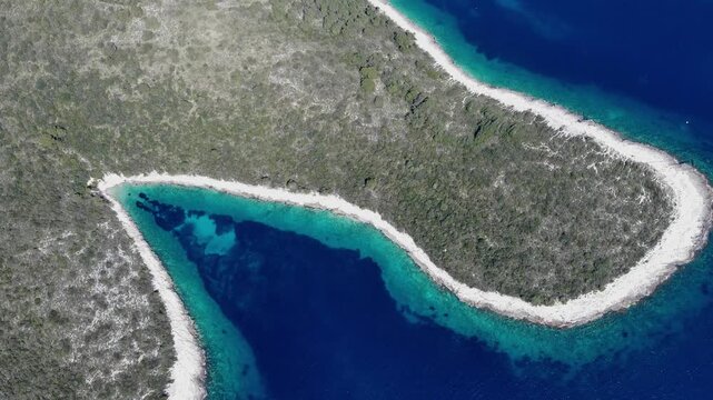 Aerial perspective of the Pakleni Islands archipelago revealing the beautiful Palmizana coast, Croatia