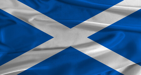 Flag of Scotland with fabric textured background. Close up of National flag of Scotland with realistic texture