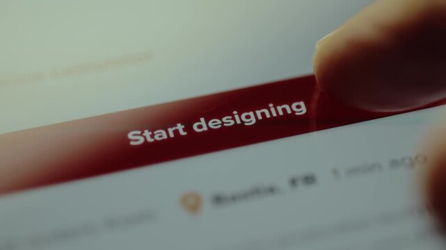 Finger points to the Start designing button, clothes customization on an online shopping application