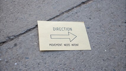 Arrow Sign with Direction and Movement Needs Intent on Ground