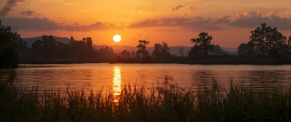 Lake sunset silhouette during twilight