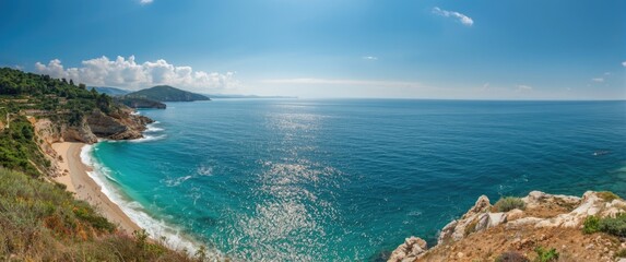 Fototapeta premium Bright sunlight illuminates the beautiful Mediterranean Sea as it hits the rocks