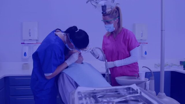Animation of pattern and purple tint over patient in dentist chair and dentists