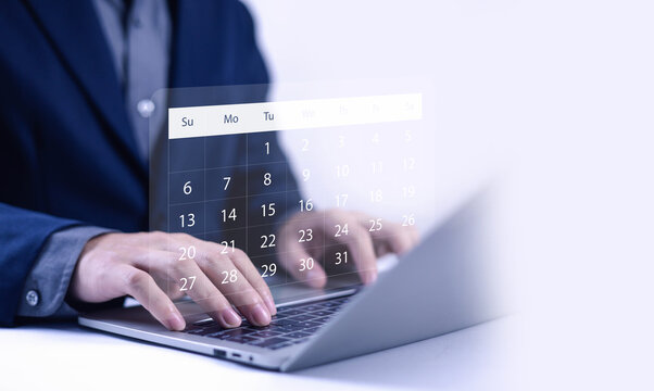 
Person using laptop with digital calendar interface highlighting schedule dates. Concept of time management, business planning, productivity, deadline reminder, online scheduling, work organization.
