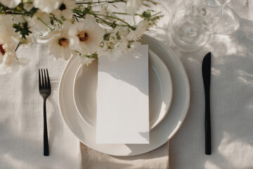 Minimalist table setting with blank menu card