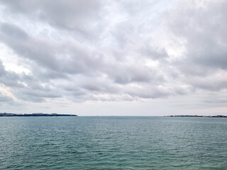 Obraz premium Open seascape view under cloudy dramatic sky