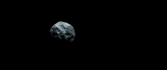 Fototapeta premium Single asteroid featuring craters, set against a dark space background