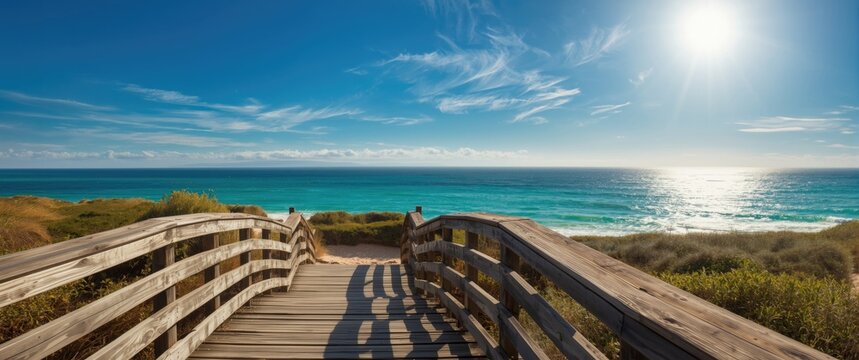 Wooden stairs on an empty stairway leading down, overlooking the ocean or seascape