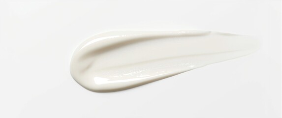 Cosmetic cream on a plain white backdrop