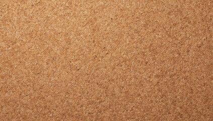 Fototapeta premium Office decor featuring a brown cork wood textured wall surface, serving as a functional background for workspace layout